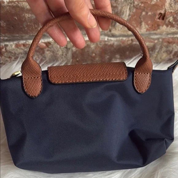 Navy cosmetic pouchwith strap